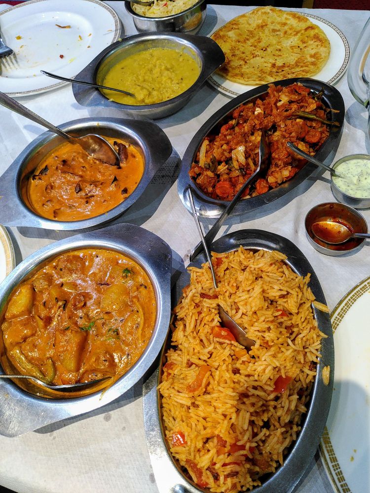 Dal, Vegetable Kothu, Tomato Rice, Bombay Aloo, Aubergine Curry 