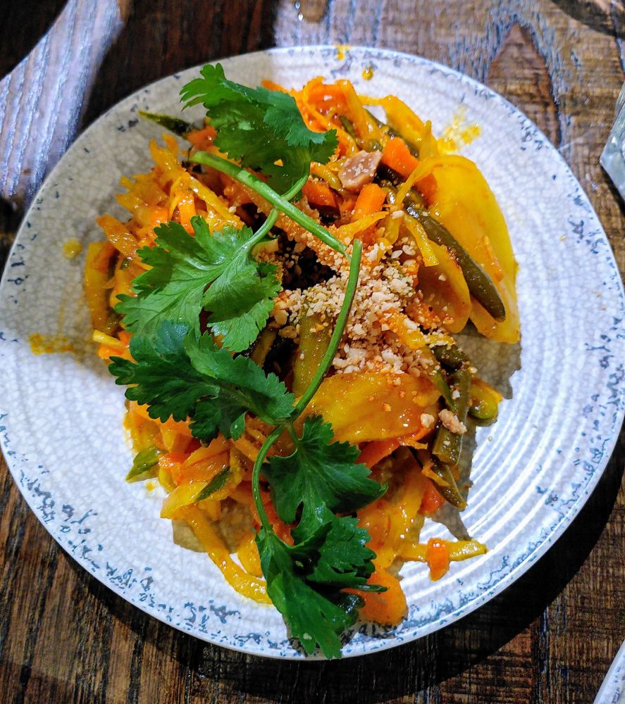Acar Timun
Spicy Crunchy Salad topped with crushed peanuts