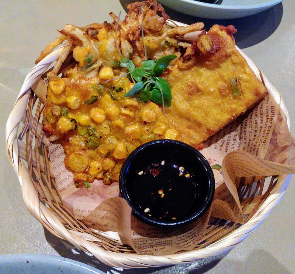 Tempe Mendoan, Bakwan Jagung, Bakwan Sayur 
Trio of Deep-fried Fritters, Fermented Soya Bean, Sweet Corn and Mixed Vegetables