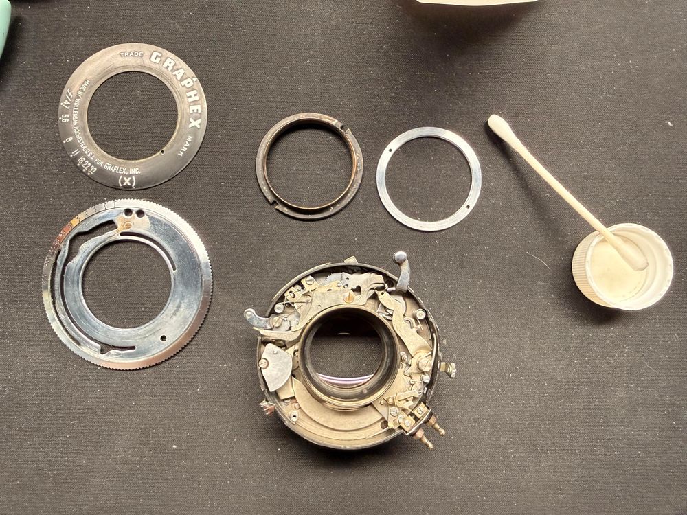 Partially disassembled Graphex Wollensak lens showing gears and escapement assembly