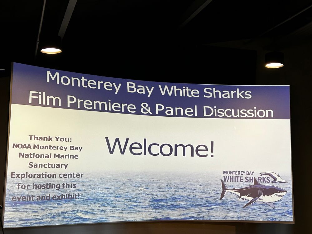 Welcome slide for the Monterey Bay White Sharks film premiere. 