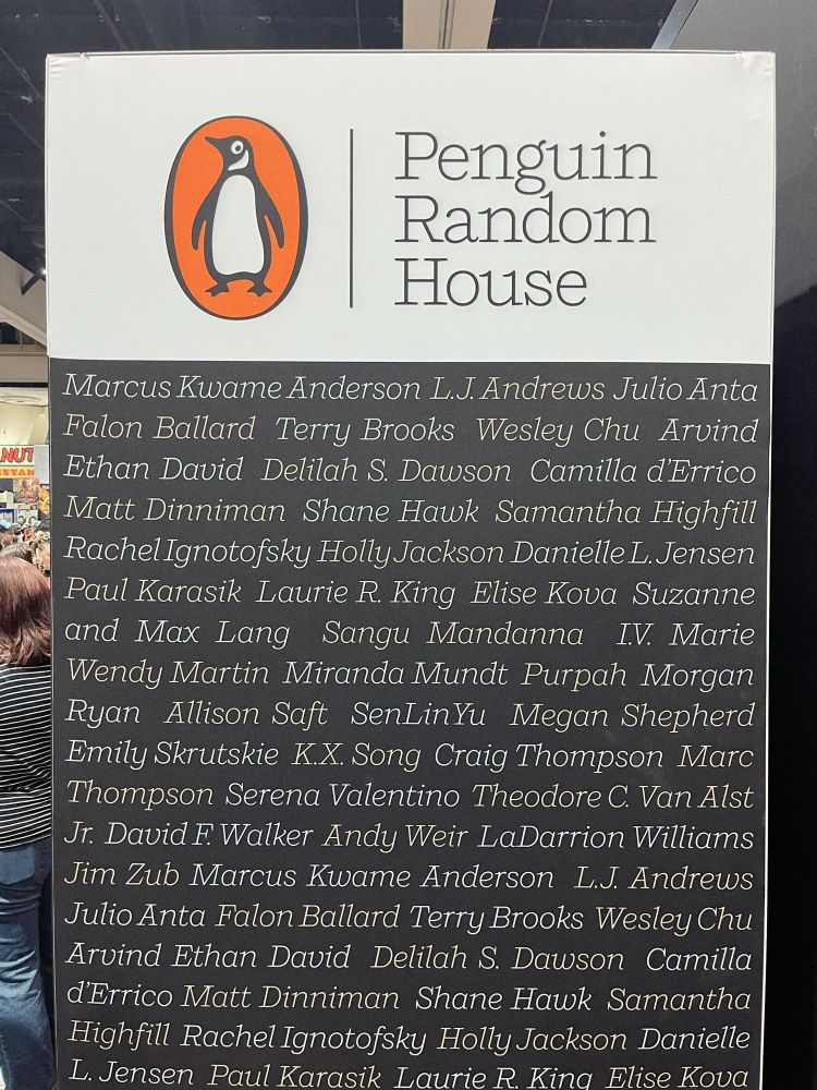 A wall of text at Penguin Random House’s SDCC booth featuring names of all the authors here in attendance for panels and signings. Including Shane Hawk and Theodore C. Van Alst