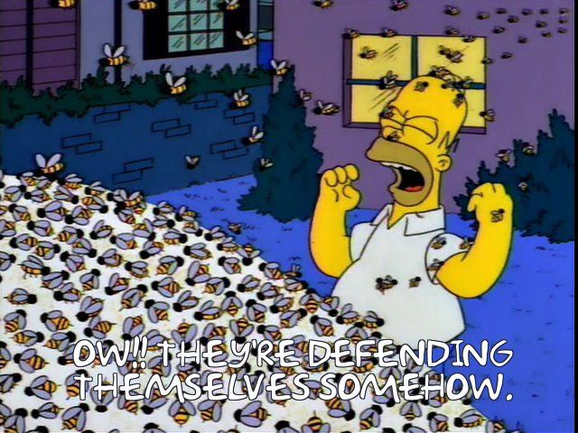 Homer: "Ow!! They're defending themselves somehow."