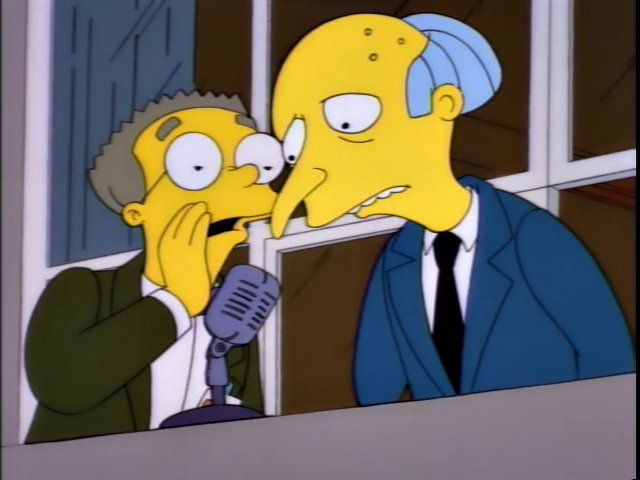 Smithers whispering in Mr. Burns's ear