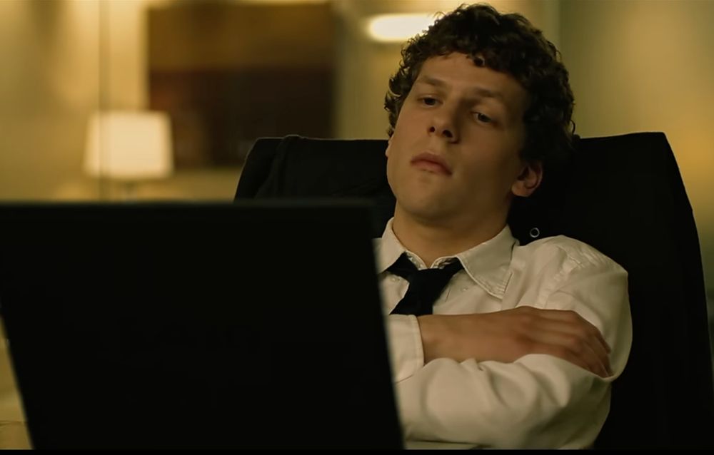 jesse eisenberg refreshing his computer at the end of The Social Network
