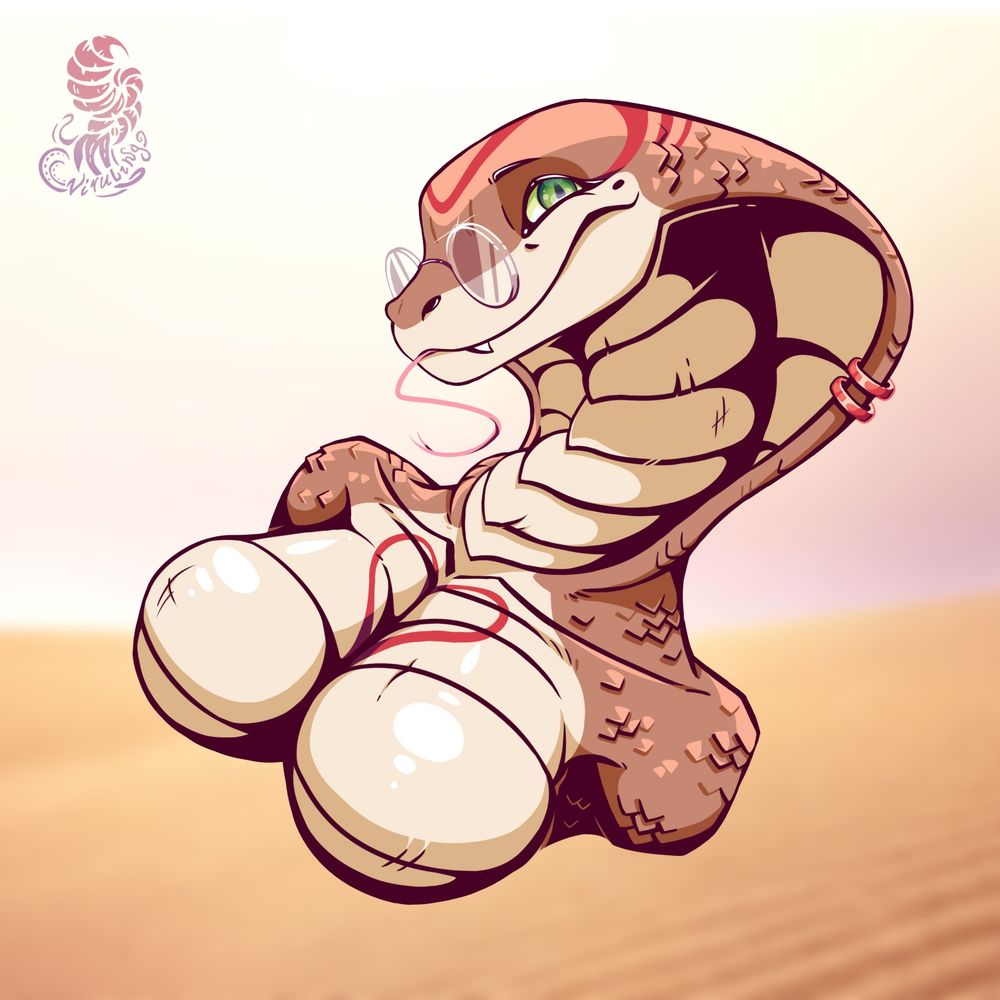The image features a cartoon cobra character. It's stylized with large, rounded body sections and an expressive face. The cobra has a raised hood and is colored in shades of brown and cream. The background appears to be a blurred desert scene. There's a small watermark or logo in the upper left corner.