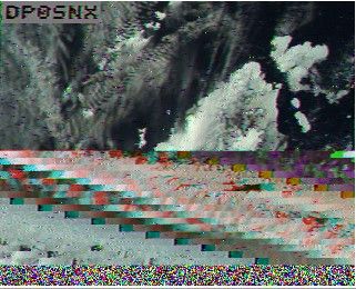 SONATE-2 SSTV (Martin 1) image as received on 145.880 MHz. I was able to correct the slant this time, but something happened halfway during the transmission that hosed up the image. Shown are some clouds over North America.