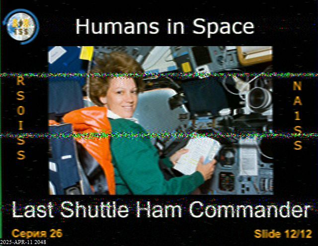SSTV image 12 of 12 as received from the ISS on 04/11/2025 at 20:48 UTC. 
"Humans in Space"
"Last Shuttle Ham Commander"