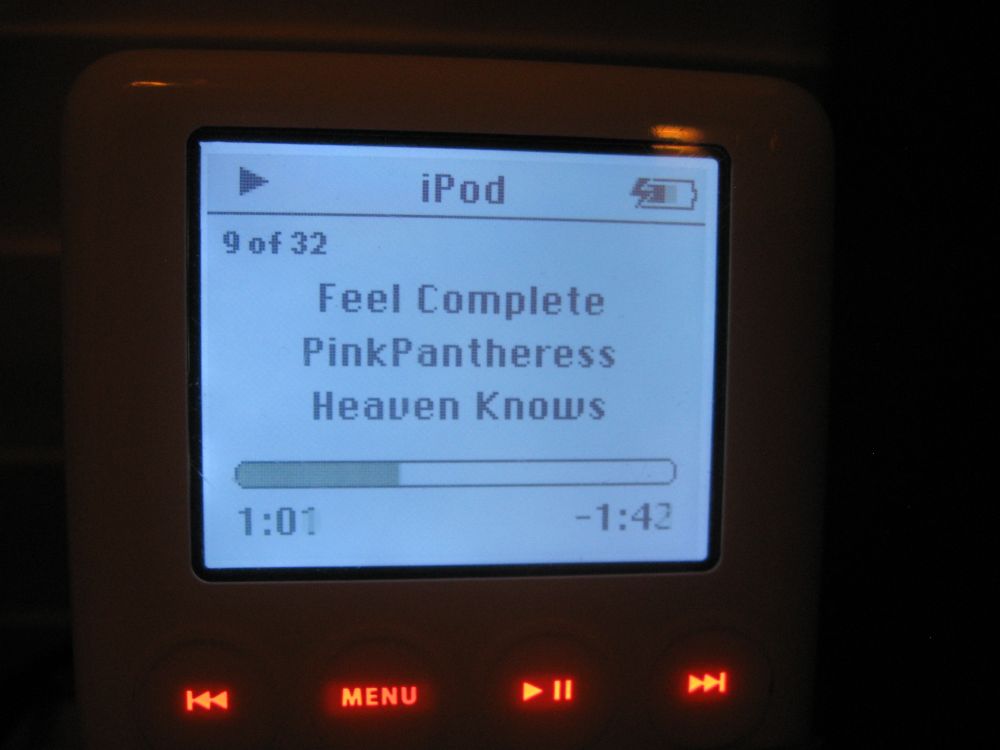 Zoomed out photo of an iPod playing Fell Complete by PinkPantheress