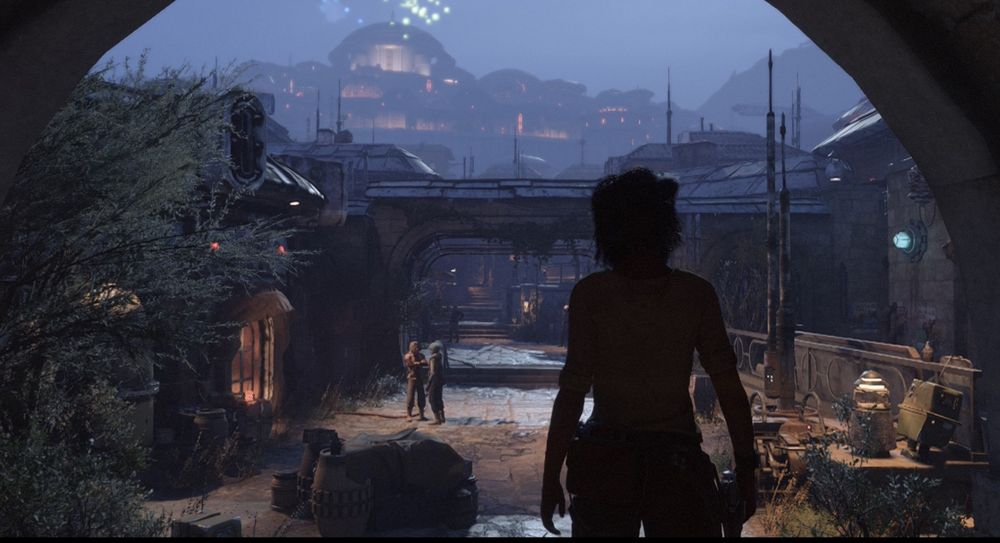 A woman stares into a dusky town on an alien world 