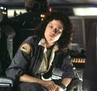 Sigourney Weaver in Aliens, sitting in a chair.