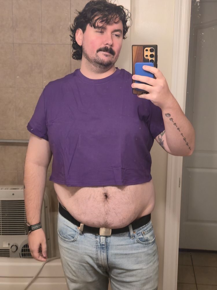 Another picture of me in a crop top, but this time, in purple!