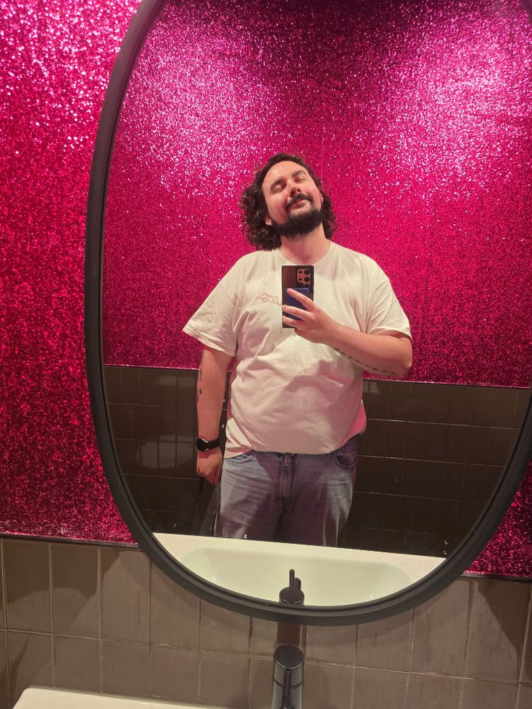 A selfie I took in a gay bar bathroom