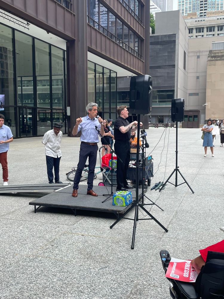Daniel Biss speaks at the rally demanding a special session to fund Chicagoland public transit