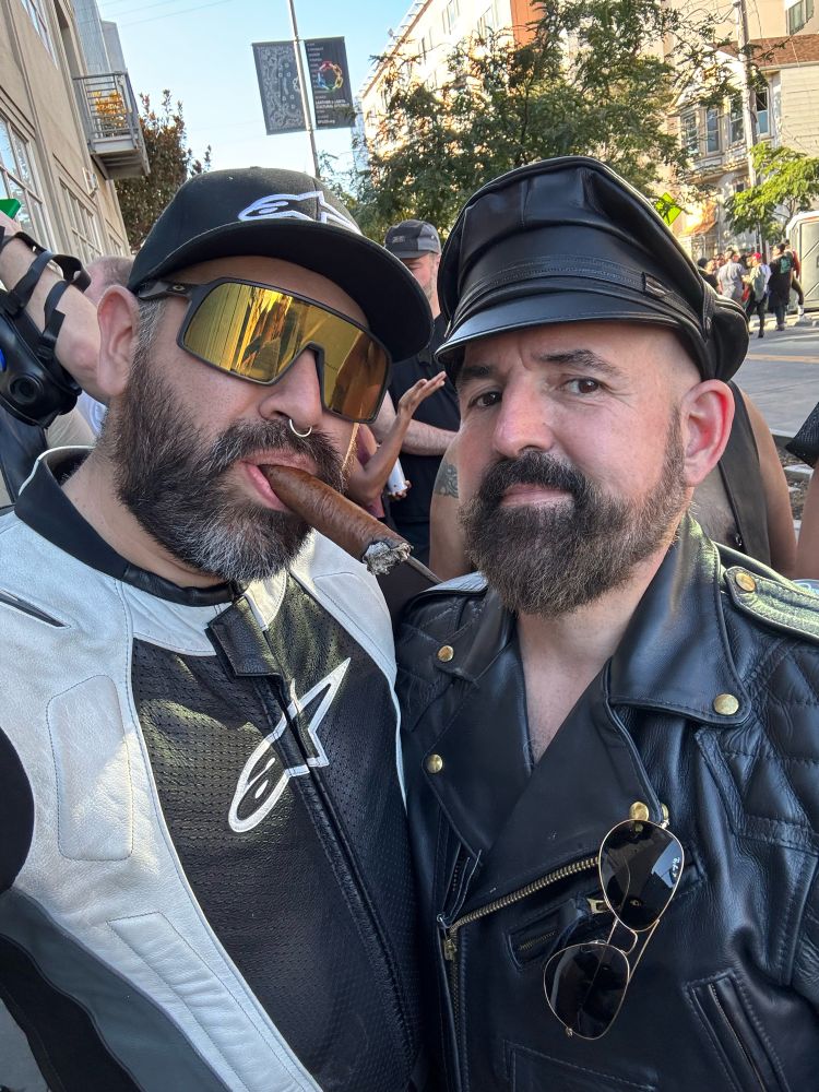 Two sticks and I in leather, I’m smoking a cigar