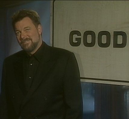 Jonathan Frakes with a sign behind him that says GOOD