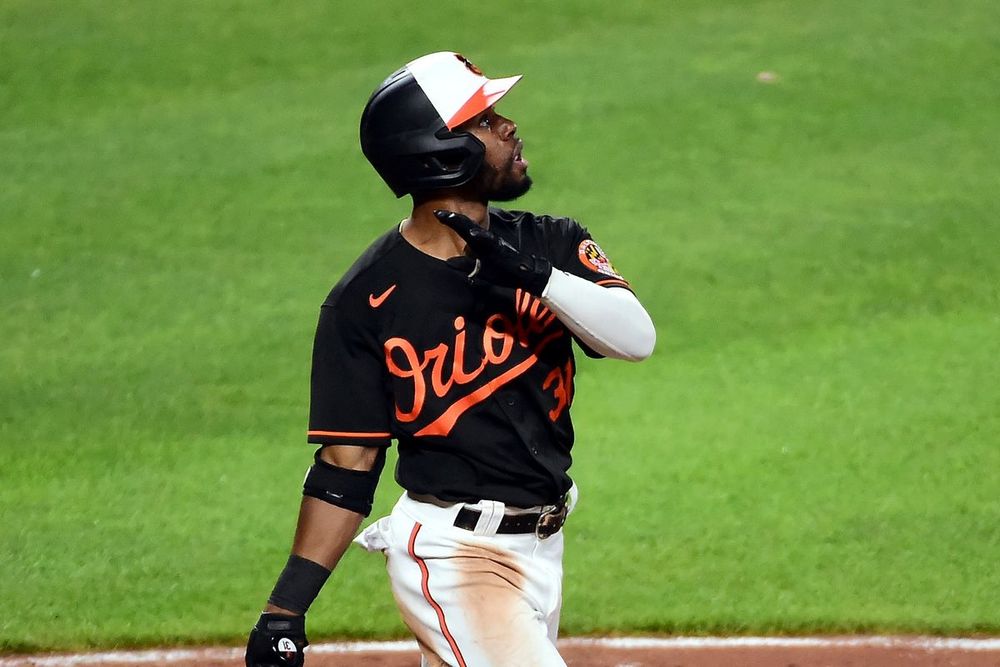 Cedric Mullins admiring a home run in 2021