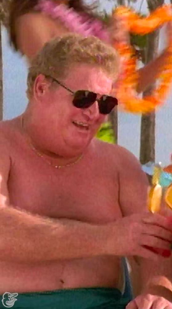 Sexy Boog Powell enjoying some sunshine with a cocktail in hand