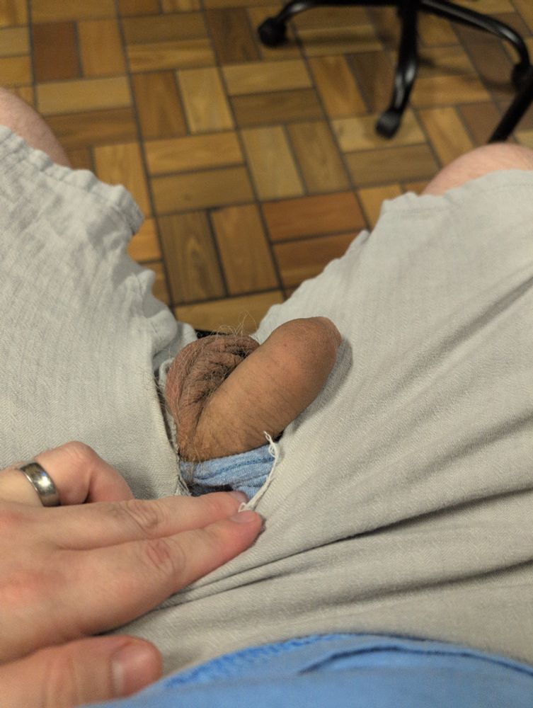 My Soft uncut cock being on display through a hole in my shorts 