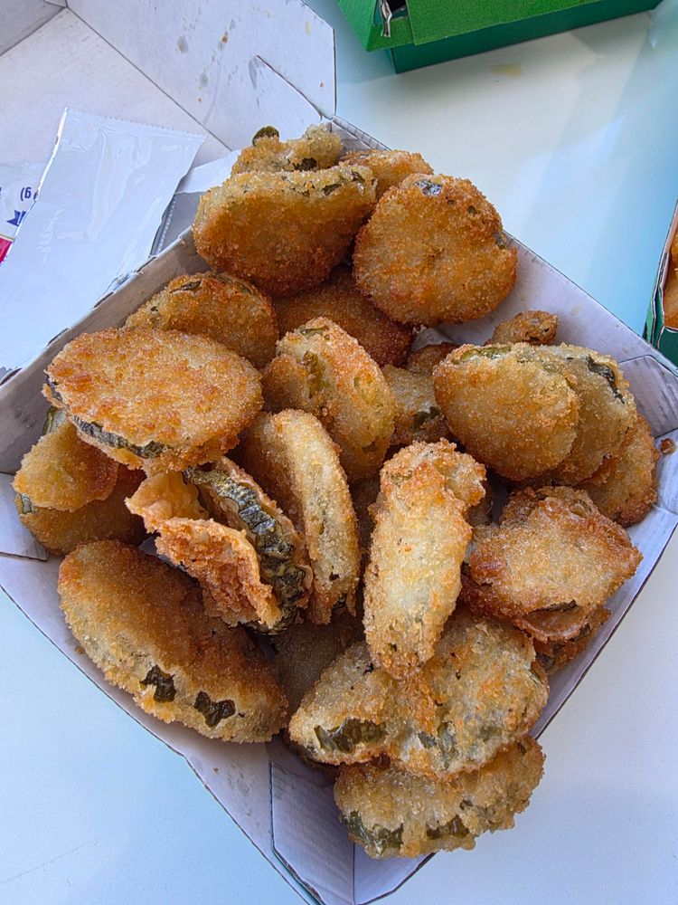 Photo of fried pickles in a box 