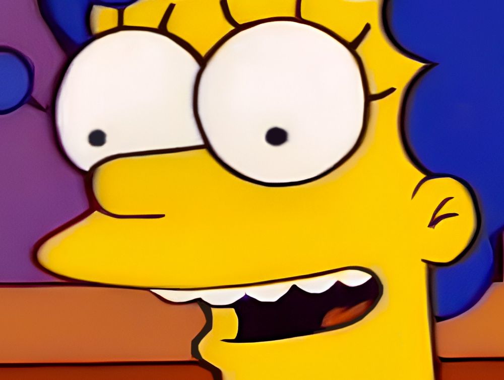 An extreme close-up of Marge Simpons's face from the iconic "I just think they're neat" scene.