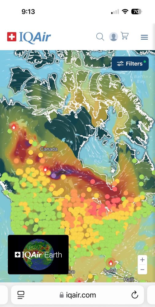Screenshot of map of Canada showing air quality through colours: green for good in British Columbia and the east coast, gradations of worsening air quality from yellow and orange across most of the country, hazardous red in Alberta, Saskatchewan, Manitoba, Ontario and Quebec, and very dangerous purple where hundreds of wildfires are currently blazing in the middle of Saskatchewan and Manitoba. The jet streams pushing a lot of the wildfire smoke particulates into all of Ontario and Quebec showing up as mostly red. Taken from IQ Air website link in the post. 