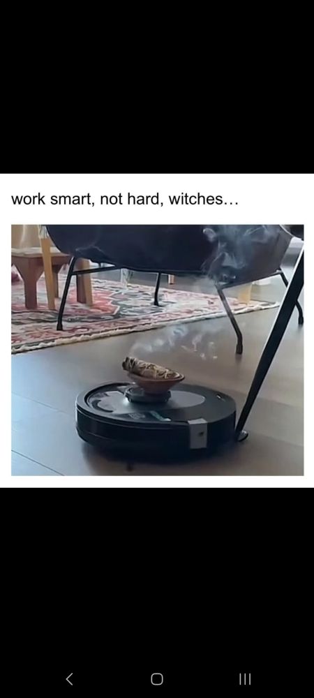 Caption: Work smart, not hard, witches...
Picture: A sage smudge stick, smoking on a seashell, balanced on a rumba vacuum.