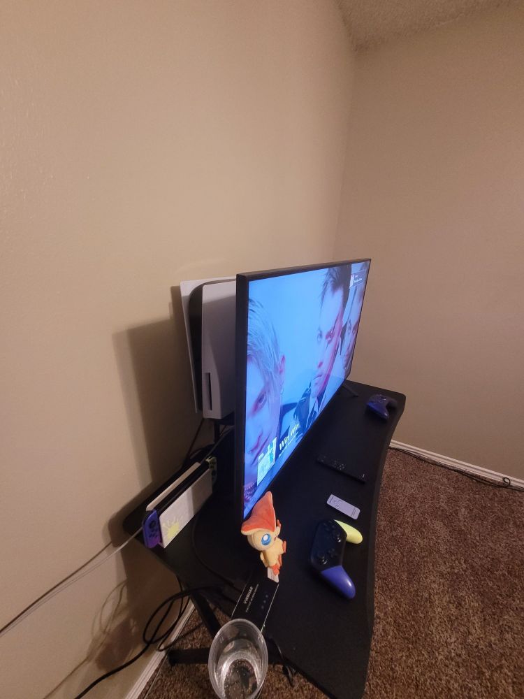 Angle 2 of new media room setup, including showing a hidden PlayStation 5 behind a tv