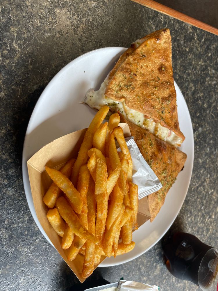 Chicken Bacon Parmesan stuffed pizza melts with extra crispy fries from Pizza Hut