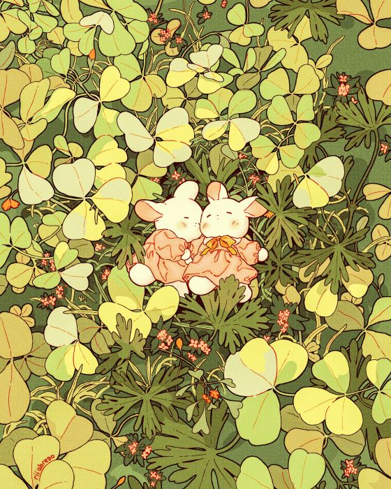 An illustration of two tiny rabbits sleeping in a patch of sprouting plants