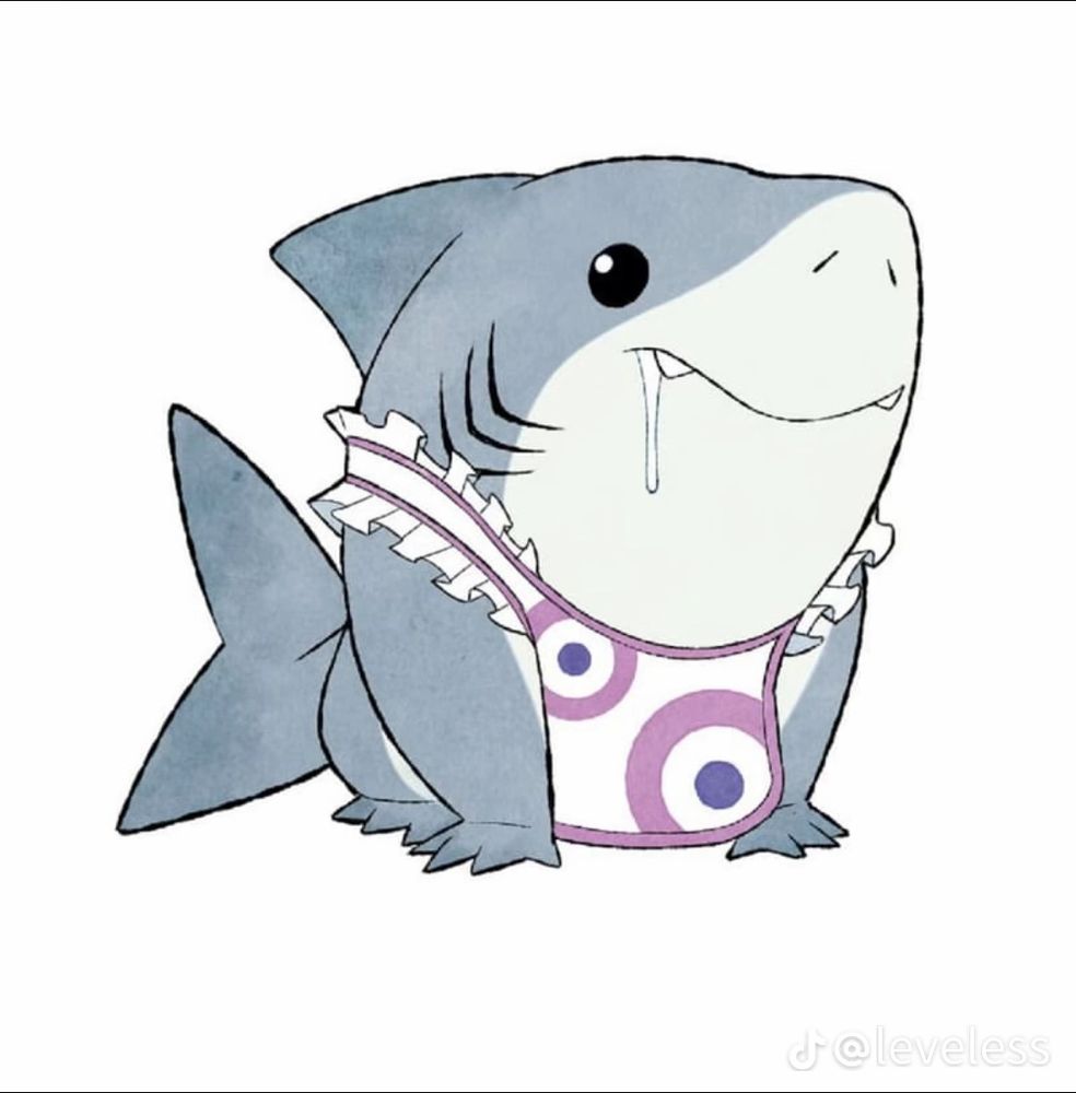 Jeff the land shark wearing an apron