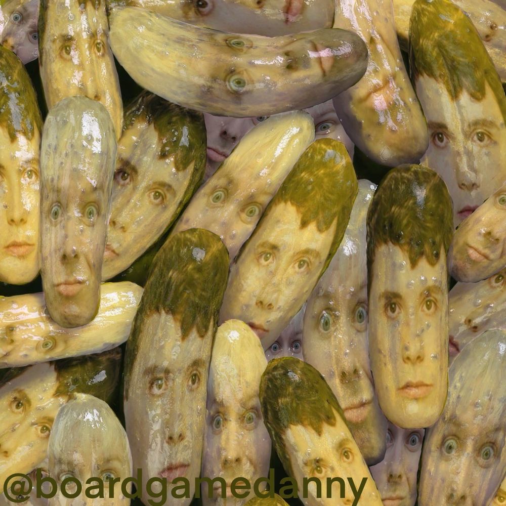 Daniel howell and Philip Lesters faces edited on to pickles 