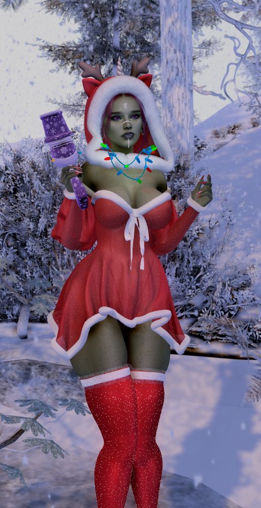 Green skin goblin woman wearing a red dress and boots with white fuzzy trim. She holds a purple snowball blaster and stands in a snowy landscape