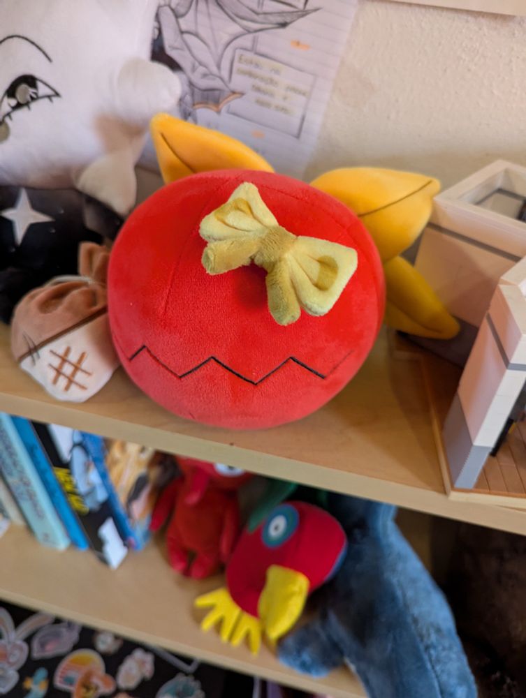 A plush of the character Chompy from Bug Fables