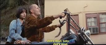 Still from Pulp Fiction movie with Bruce Willis's character and girlfriend on Zed's Chopper saying "Zed's dead baby, Zed's dead" #SpéirGhorm 
