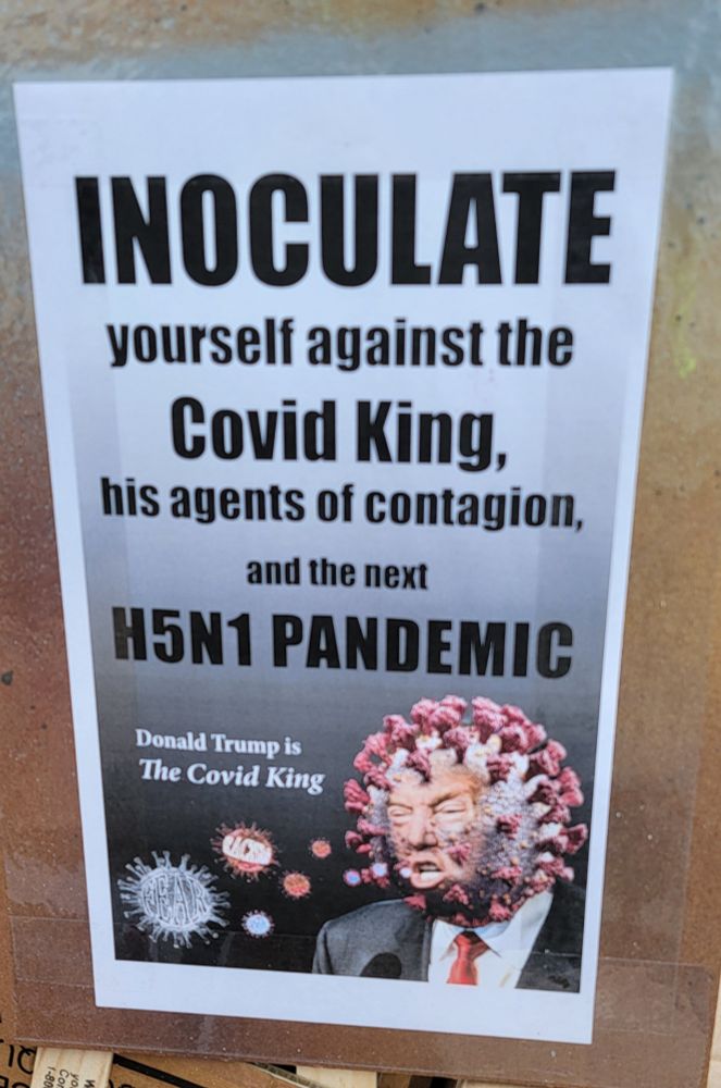 Sign with a picture of Trump as a virus. Text "Inoculate yourself against the covid king, his agents of contagion, and the next H5N1 pandemic "