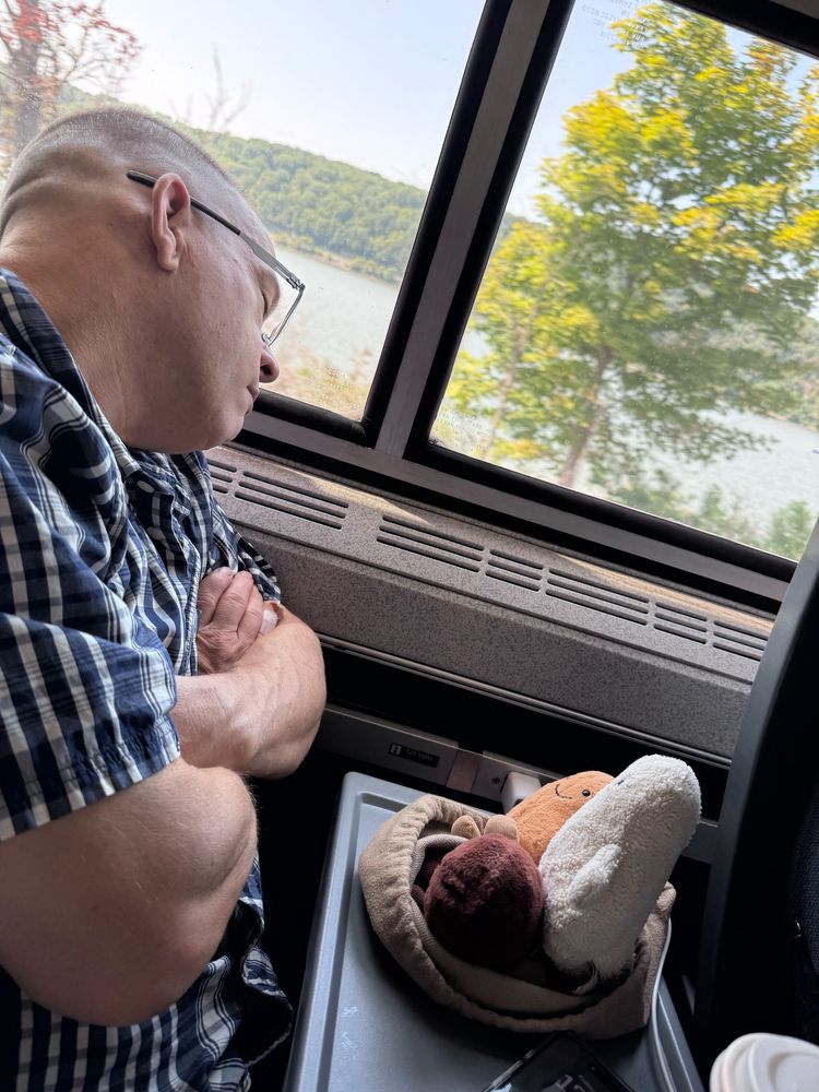 man sleeping on Amtrak train 