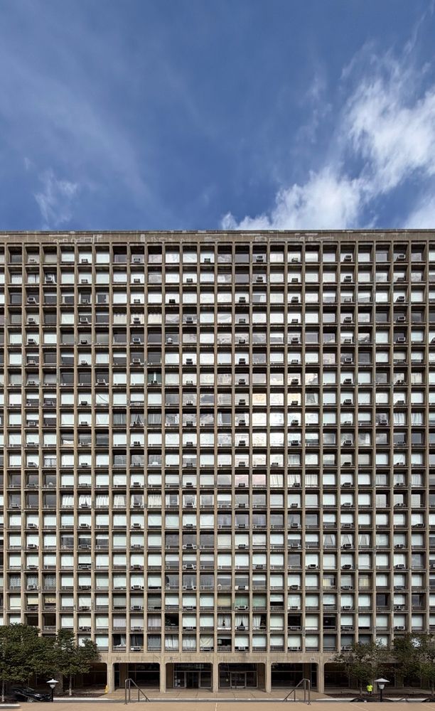 parallax-corrected picture of a modernist concrete building 