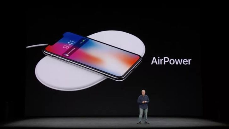 a photo of a scene from an apple wwdc in years gone by, announcing the forthcoming air power charging station, which never worked