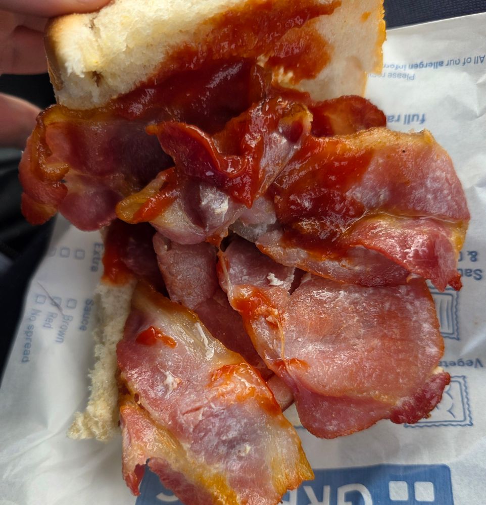 Greggs bacon sandwich with a lot of bacon. Maybe 6 slices.