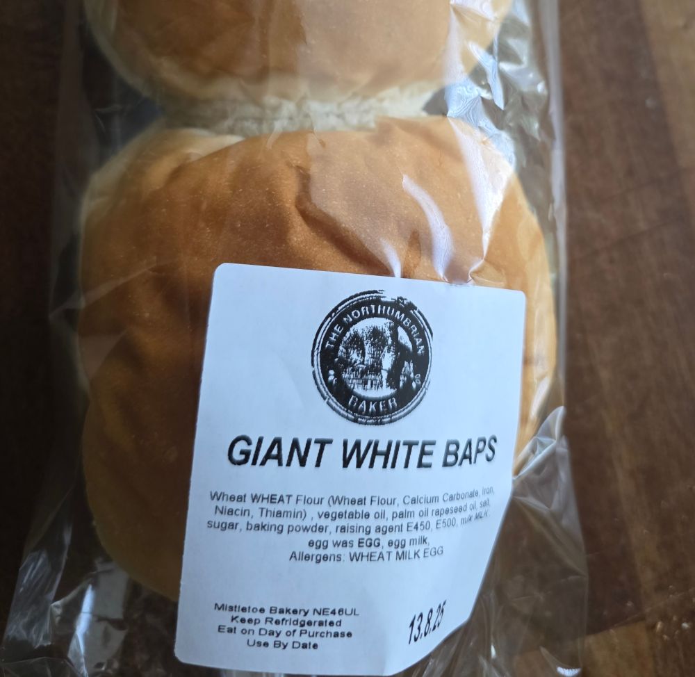 A pack.of two bread buns with the tag Giant White Baps.