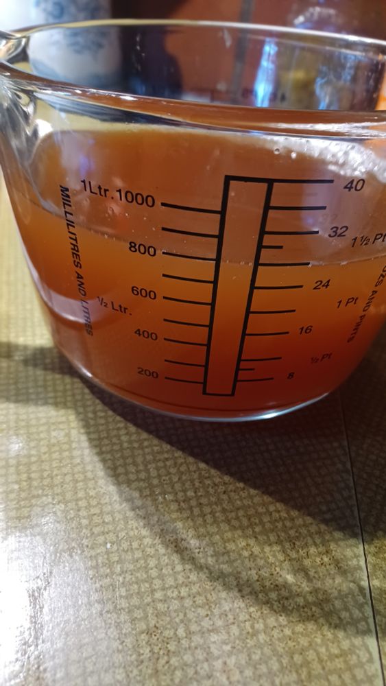 Melted about .25 liters of a neighbor's honey into .55 liters of wort left over from the brewday.  I let it boil lightly for about a half hour to kill off any bacteria or wild yeasts before adding directly to the ferm vessel.