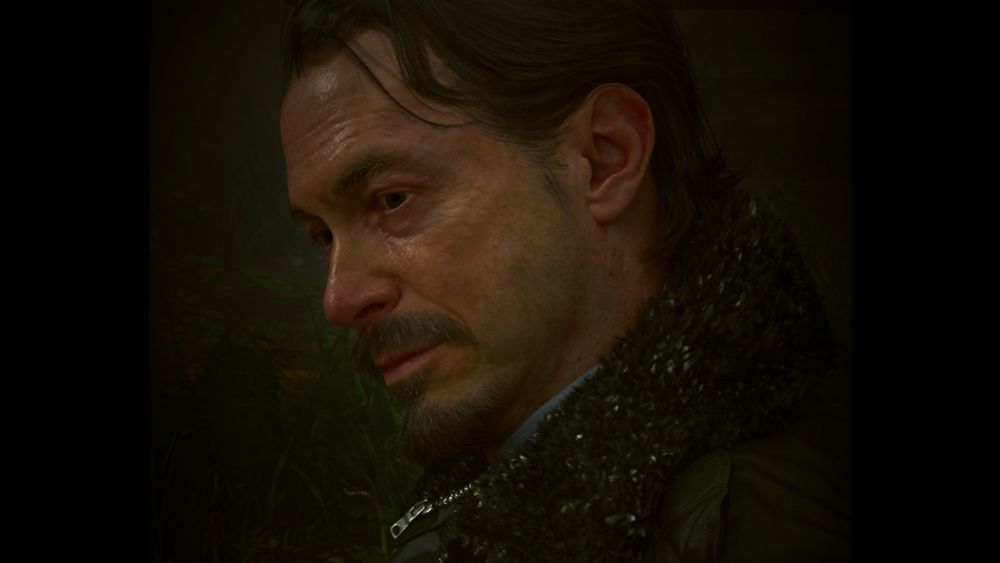 Profile shot of Deputy Thornton from Alan Wake 2 smiling gently at the viewer. 