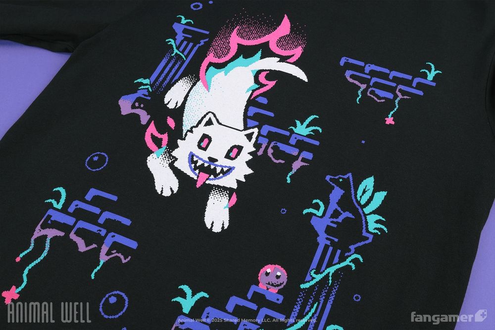 A photograph of a black Animal Well long-sleeved shirt. A ghost slips down across the design toward the player character.
