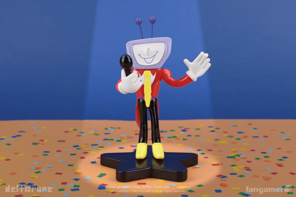 A photograph of the upcoming Tenna bendy figurine. The figurine resembles the Tenna 3D render, with big, bendable arms, and stands on a black star base.