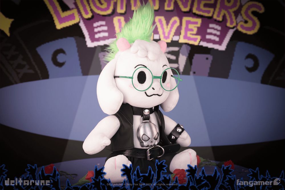 A photo of the No Hat Ralsei plush in a new Rockstar Ralsei costume resembling the Lightners Live scenes from Chapter 3 of DELTARUNE