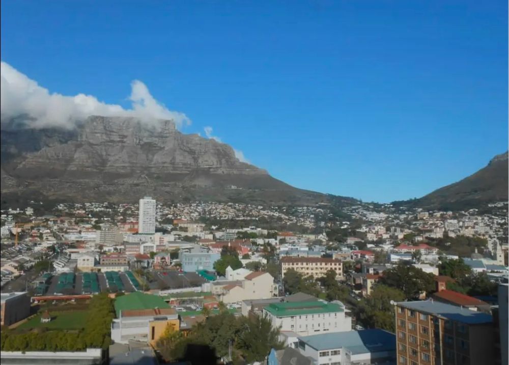 central Cape Town urban fabric spread out at the base of Table Mountain