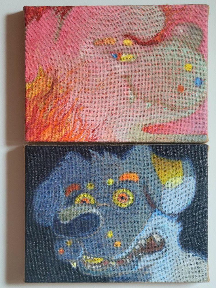 A small diptych, two paintings on burlap stacked one above the other. One on top depicts an anthropomorphic dog with a mischievous grin, turned away from the viewer but glancing back at them. A fire licks at the back of their head. The bottom depicts that same dog turned around, the color palette shifted from red to blue. The dog stares out into the middle distance past the viewer, a look of shock on his face