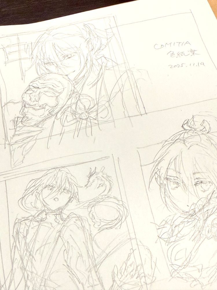 色紙に描く案をクロッキー帳に描いています