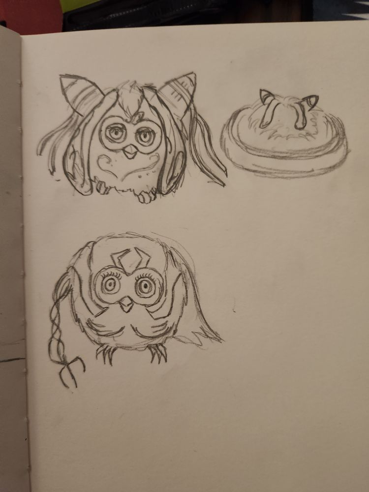 Tamiyo and Tezzeret as Furbies, plus Tamiyo as a tribble.